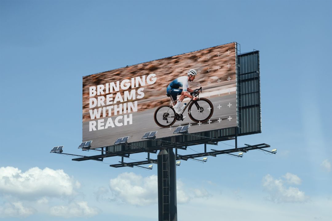 Billboard voor 3Coach met een wielrenner en de tekst Bringing dreams within reach